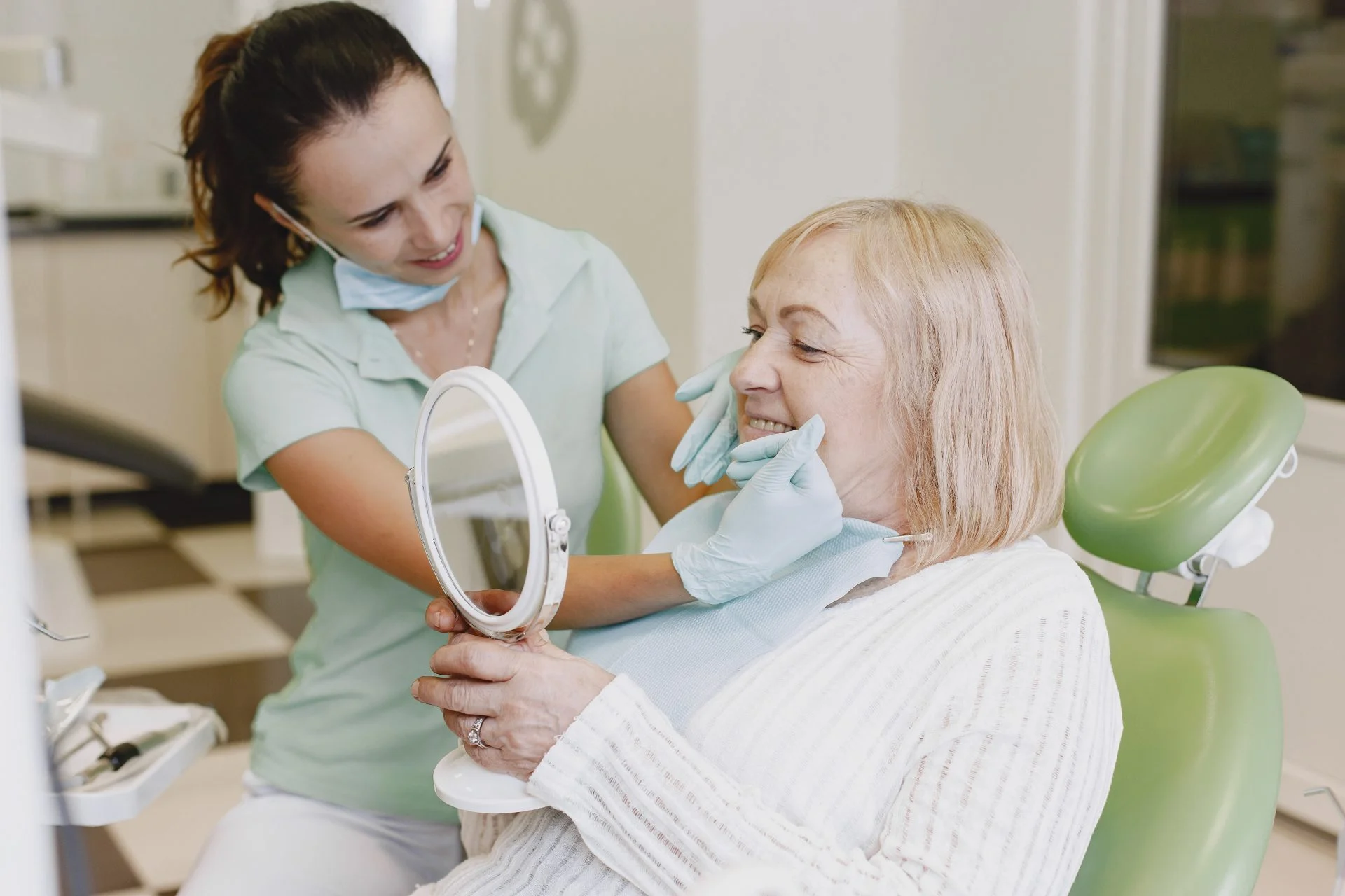 woman having dental treatment at dentist's office